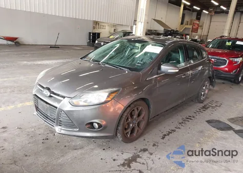 2014 Ford Focus Titanium z USA, uszkodzony, nr VIN 1FADP3N23EL317257
